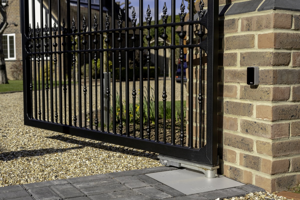 Automated driveway gate with motor — professional installation